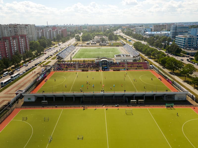 aerial-view-grass-field-hockey (1) luxury portable restrooms for sports events